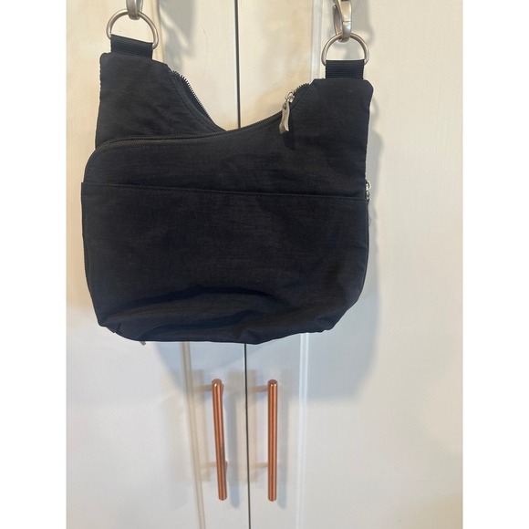 baggallini black travel bag crossbody Anti-Theft Activity Vertical orientation makes this a smart choice for airport days—stowing your ticket Baggallini Nolita Convertible Hobo